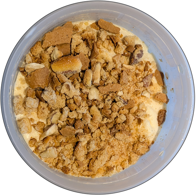 Cup from above with icecream in it and Mandelbrot crumbs on top